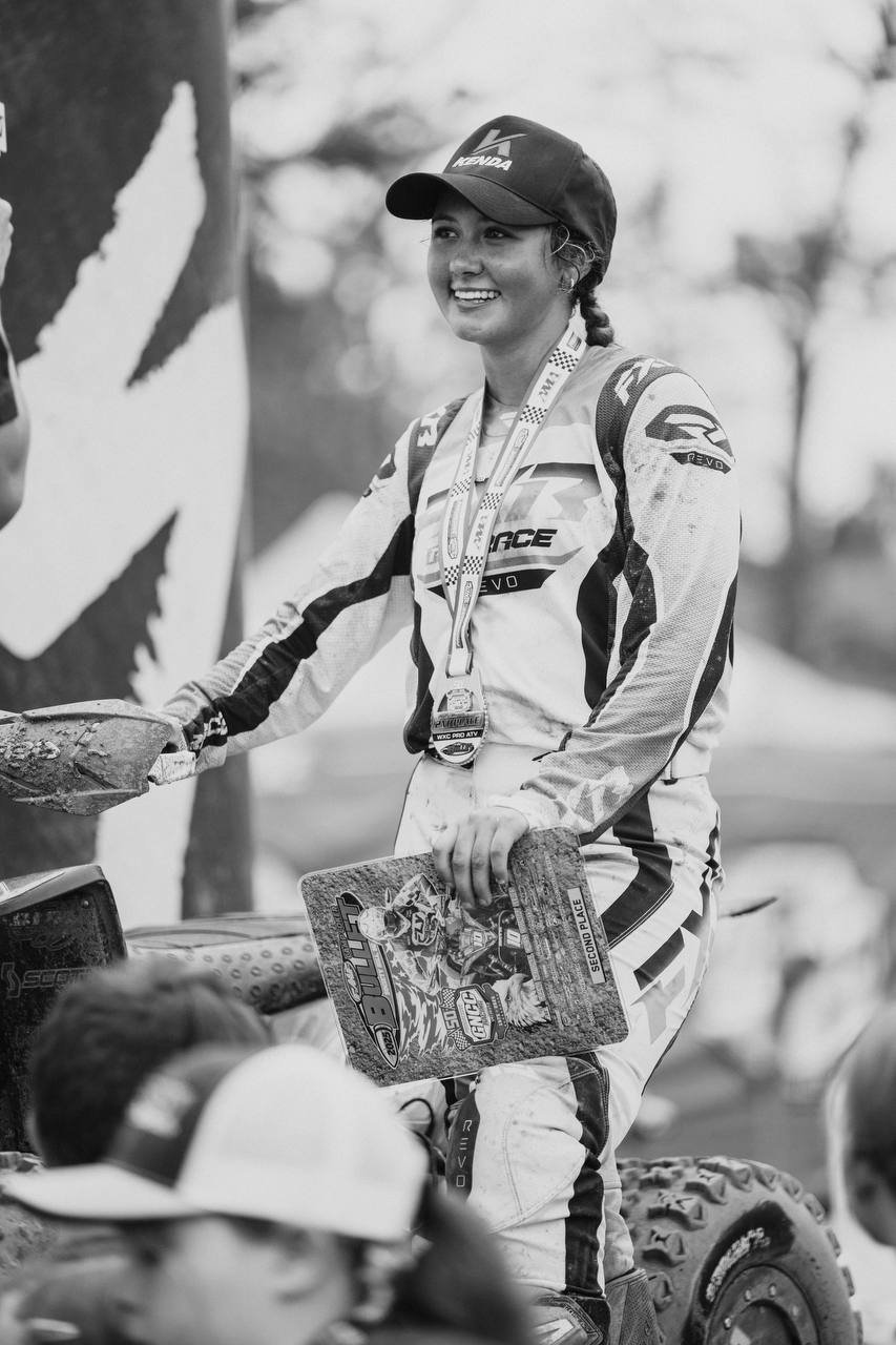 Hunter Hart on the GNCC podium with 3rd place trophy